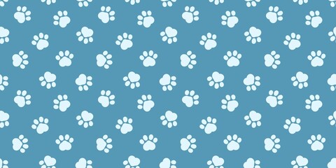Seamless pattern of cute paw print on pastel blue. Dog and cat paw footprint. © Enka Enka