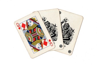 A hand of vintage playing cards showing a pair of jokers and one other card on a white background.