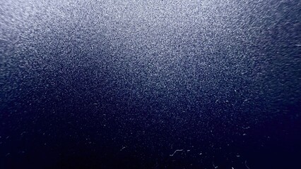 shimmering deep navy metallic sparkle texture with fine glitter grain detail perfect for modern...