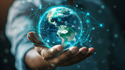 Man hand holding digital Earth planet representing global technologies concept
