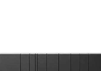 Sleek, straight, charcoal gray composite strips with precise edges forming a minimalist border at the bottom, against a vast, transparent copy space; concept of modern architectural design