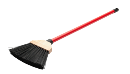 Broom with long red handle household cleaning tool for sweeping floors and janitorial use isolated on white background