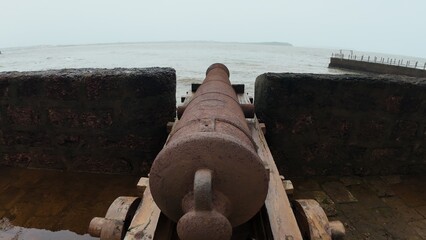 Rustic Old Cannon Overlooking the Arabian Sea from Aguada Central Jail Goa, India