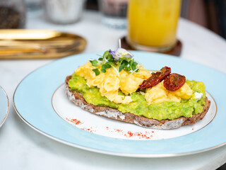 Open sandwich with avocado and egg