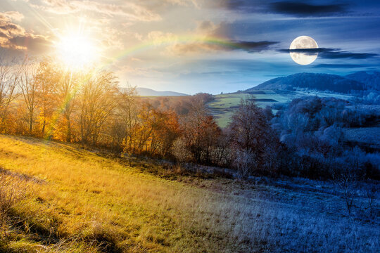 rural landscape on autumn equinox. day and night time change concept. trees on rolling hills. scenic view of mountainous countryside in fall season with sun and moon at twilight
