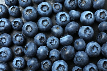 Blueberries on black background. Vegetarian concept. Blueberry macrostructure. Blueberry texture close-up