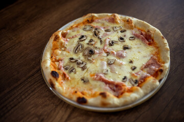 Capricciosa Pizza Served in Restaurant