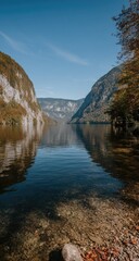 Fototapeta premium Serene lake nestled within a mountain valley.