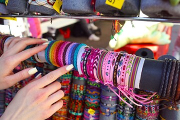 girl chooses bracelets