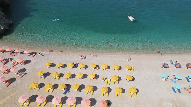 Top-down drone view of Achata sandy beach in Karpathos, revealing the stunning blue Aegean Sea stretching into the horizon