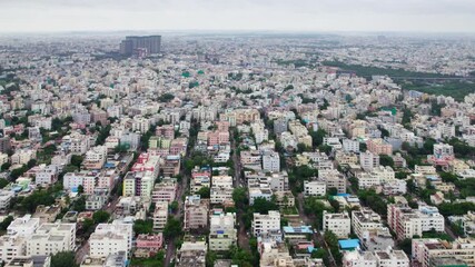 Aerial Drone View of Nagole Area in Hyderabad City with sky and trees. day time, push in, moving down, drone shot, 4k.