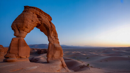 Iconic Sandstone Arch at Sunset in Desert landscape