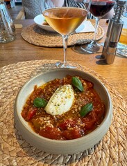 Appetizer with pickled peppers and sauce