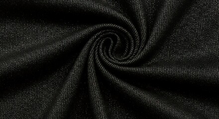 Closeup of black fabric with shimmering silver threads, creating a textured and luxurious appearance with a swirling pattern