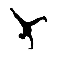 Silhouette of a gymnast performing a handstand split with legs extended