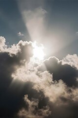 Obraz premium Sunlight breaks through dark clouds.