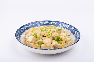 The home-cooked dish stir-fried tofu on the plate