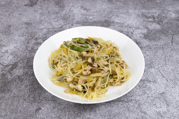 The pickled cabbage, shredded potatoes and stir-fried meat on the plate