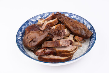 The marinated duck meat on the plate
