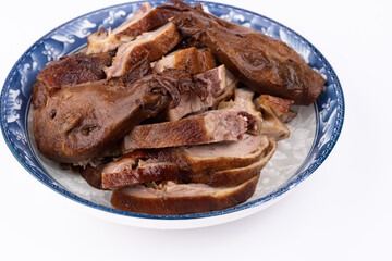 The marinated duck meat on the plate