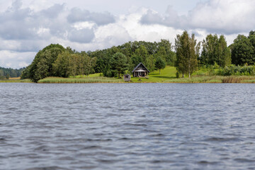 Fototapeta premium Cozy Cabin on a Lake