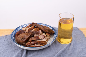 Marinated duck meat and beer beverages