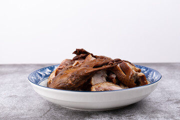 The marinated duck meat on the plate