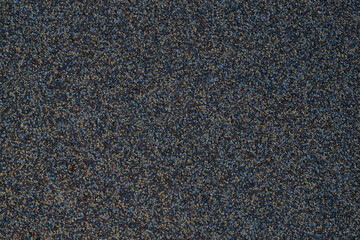 textural plaster of the house wall, colored granite chips, background