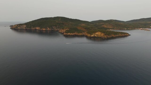 Aerial Drone Pan Shot Over Secluded Paliouri Beach And Aegean Sea In Kassandra, Halkidiki, Greece At Sunrise.