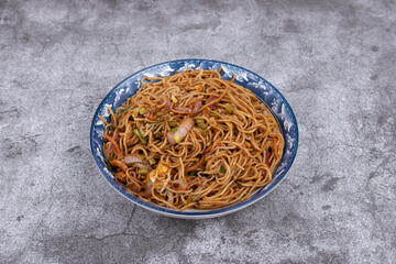 The fried noodles on the plate