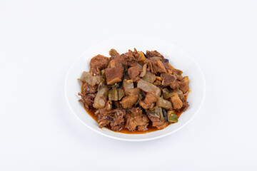 The pickled cabbage and konjac braised duck on the plate