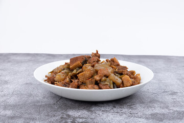The pickled cabbage and konjac braised duck on the plate
