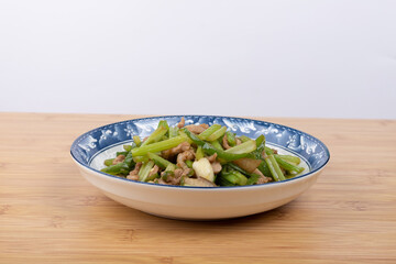 Stir-fried pork with celery on the plate