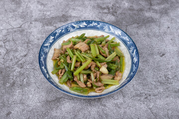 Stir-fried pork with celery on the plate