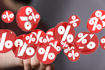 Abstract 3D render of red percentage symbols, ideal for sale, discount, finance, and business concepts.