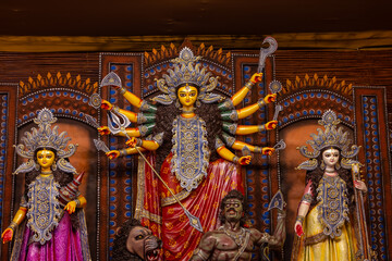 Subho mahalaya, An handmade idol of Goddess Durga decorated in colorful Pandal. 