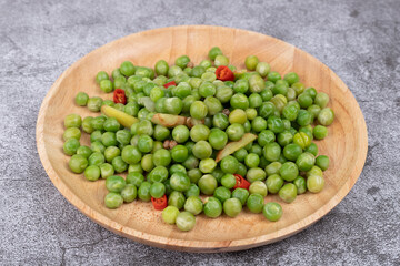 The boiled peas on the plate