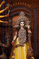Fototapeta premium Subho mahalaya, An handmade idol of Goddess Durga decorated in colorful Pandal. Durga Puja is biggest religious festival of Hinduism and for bengalis and is now celebrated worldwide.