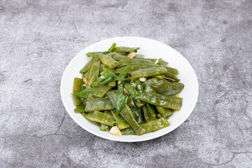 Stir-fried green beans on the plate
