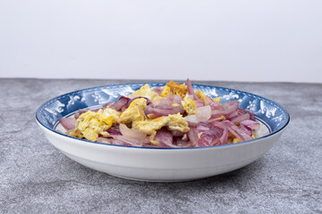Onion and egg stir-fry on the plate