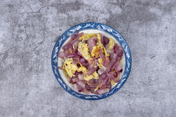 Onion and egg stir-fry on the plate