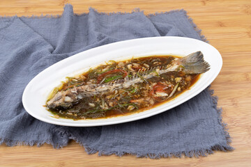 Steamed sea bass bones on the plate