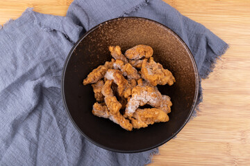 Fresh crispy meat frozen in a porcelain bowl