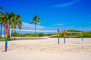 Miami Beach rainbow painted volleyball nets on the sand