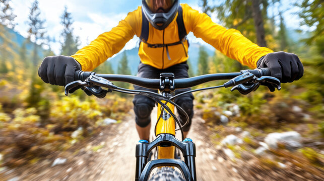 Mountain biker gripping handlebars, riding through forest trail, wearing yellow jacket and gloves - Powered by Adobe