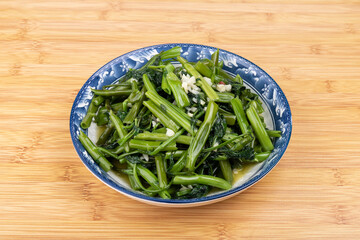 Garlic-mashed water spinach on the plate