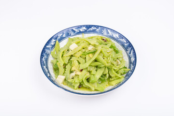 The stir-fried bitter gourd with vegetables on the plate