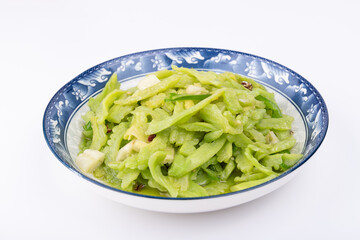 The stir-fried bitter gourd with vegetables on the plate