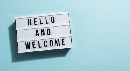 White lightbox with 'Hello and Welcome' message on a blue background.