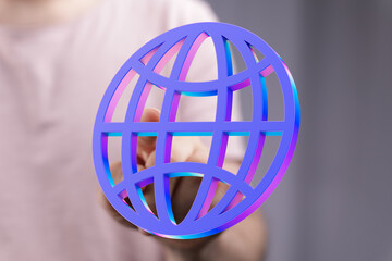 Person's hand holding a vibrant 3D globe icon, symbolizing global connection and networking.